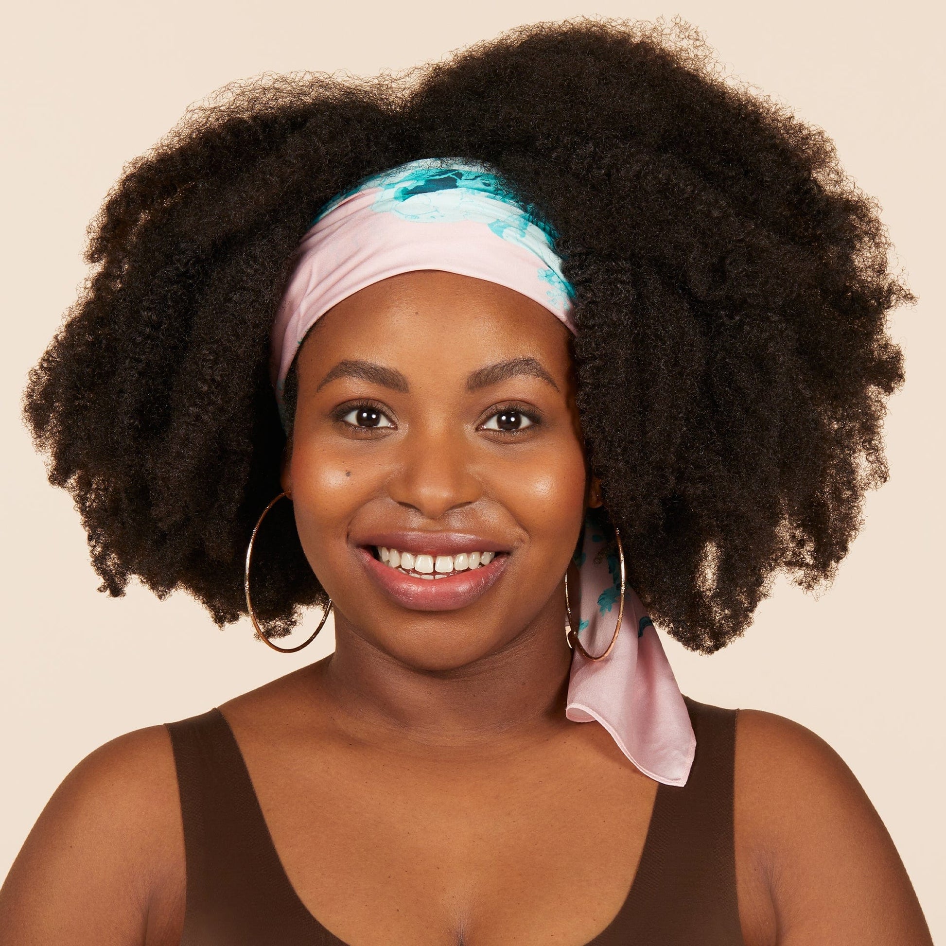 Introducing the Bouclème scarf, designed with British brand Preen using one of their iconic prints in signature Bouclème pastels using 100% recycled polyester. Vegan friendly.