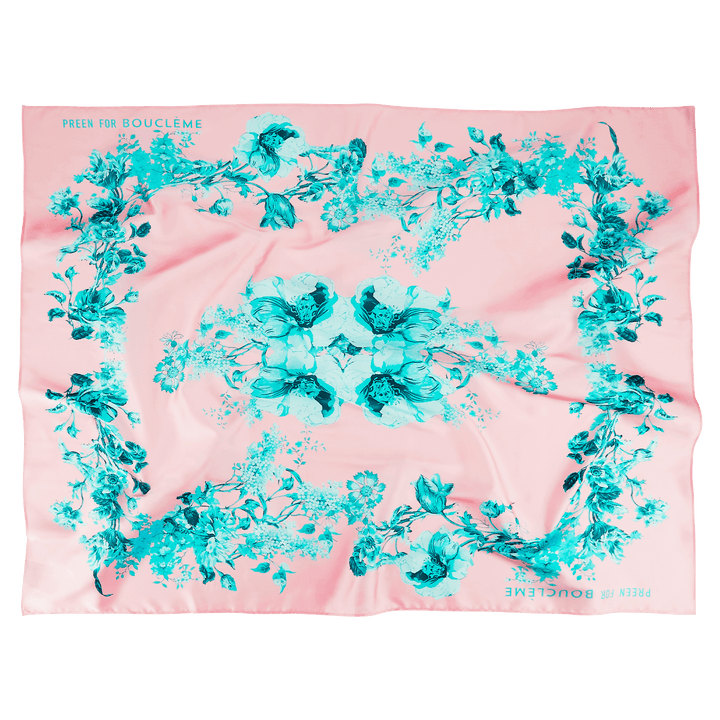 Introducing the Bouclème scarf, designed with British brand Preen using one of their iconic prints in signature Bouclème pastels using 100% recycled polyester. Vegan friendly. Introducing the Bouclème scarf, designed with British brand Preen using one of their iconic prints in signature Bouclème pastels using 100% recycled polyester. Vegan friendly. 