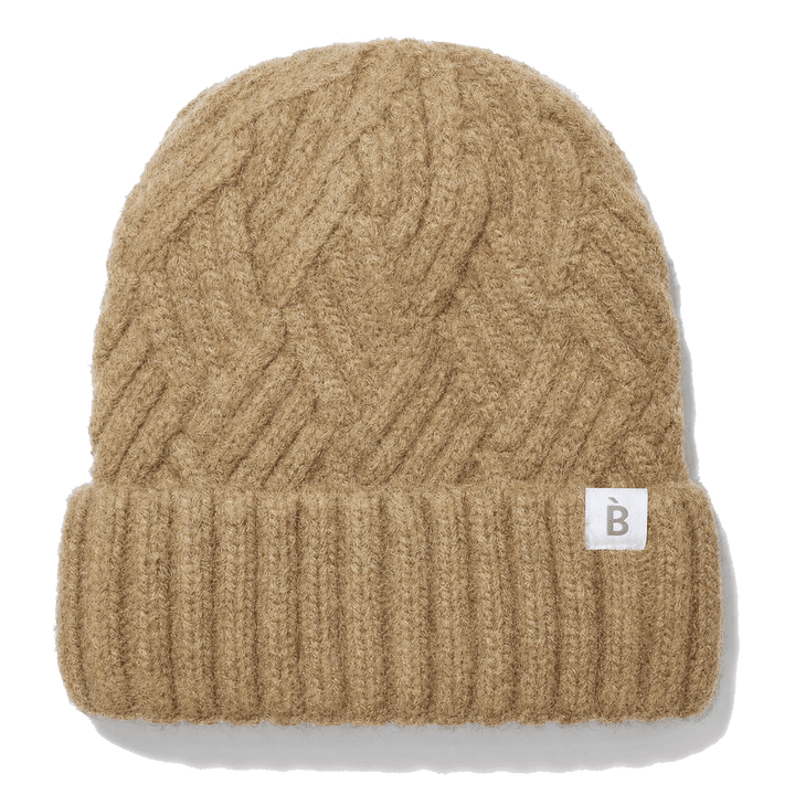 A camel cable-knit beanie hat with a ribbed cuff and a small white square label featuring a gray letter 'B', shown on a white background with a soft drop shadow.