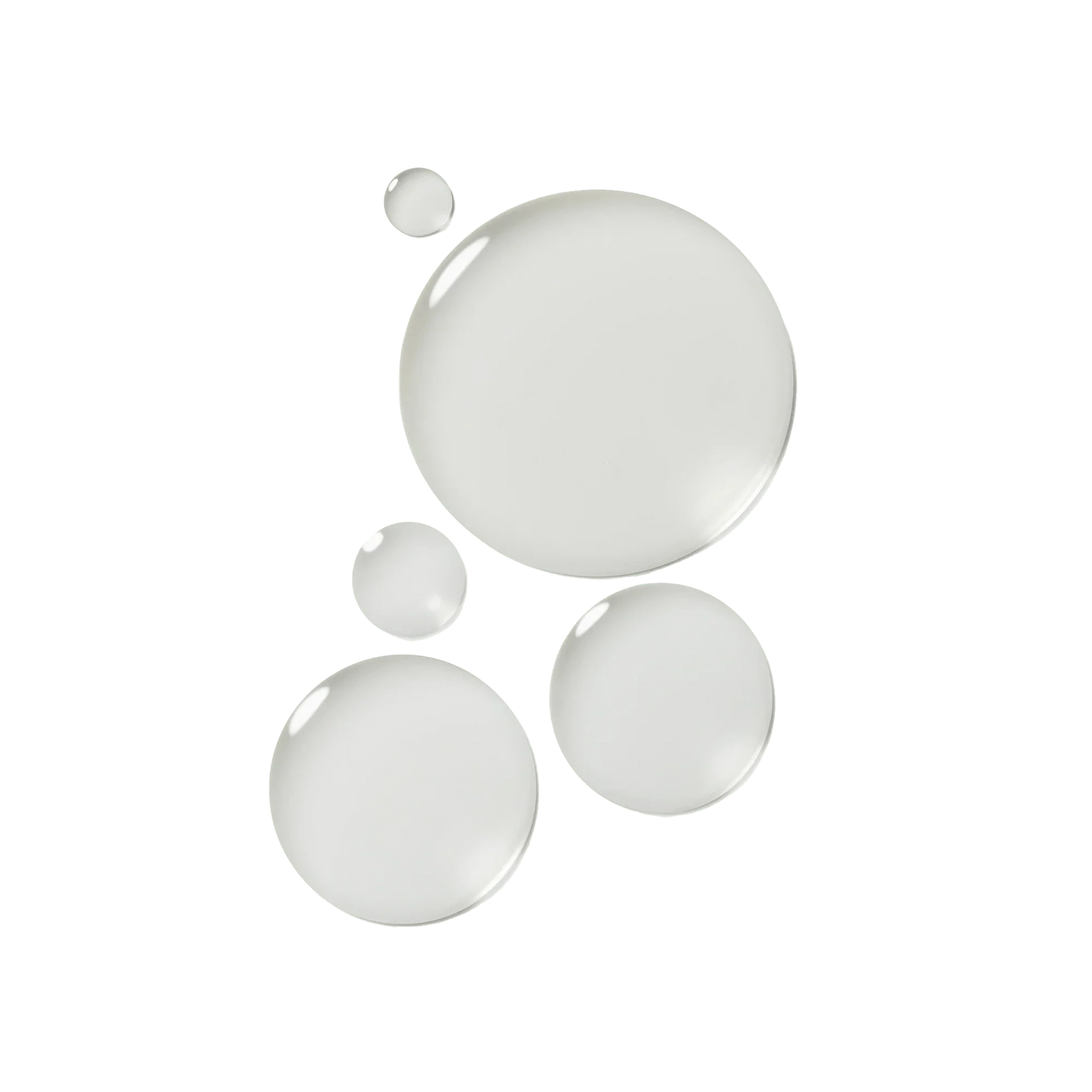 Close-up of Bouclème Curl Defence Spray mist droplets on a transparent surface, showing lightweight, non-greasy formula.