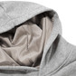 Close-up of a grey silk fabric with folds on a transparent background