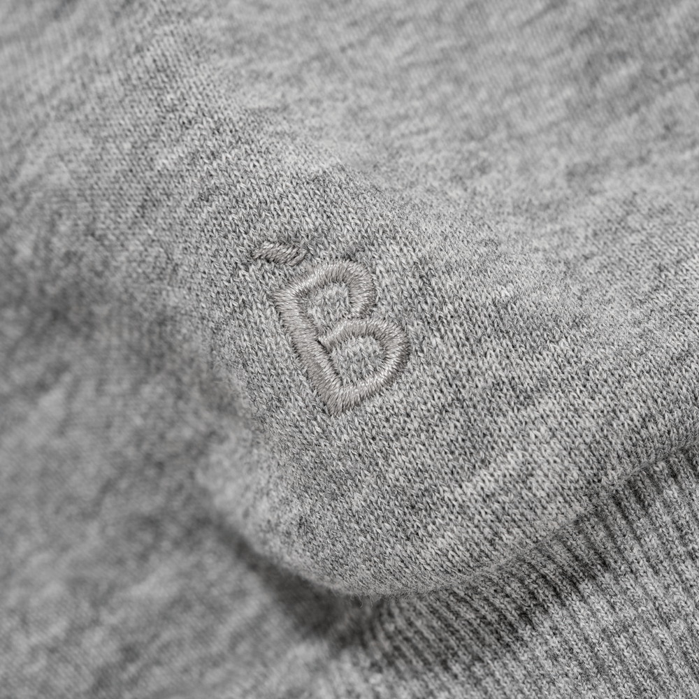 Close-up of Bouclème logo embroided on Silk Lined Grey Hoodie
